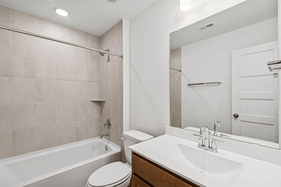 Furnished interior view inside a new home in Wildrye, Waller (Image 12).