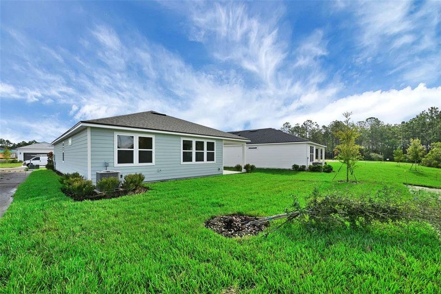 Exterior details and patio area of a home in Seminole Palms, Palm Coast (Image 23).
