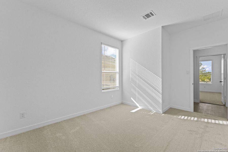 Spacious, unfurnished interior of a new home in Waterwheel: Coastline Collection, San Antonio (Image 9).