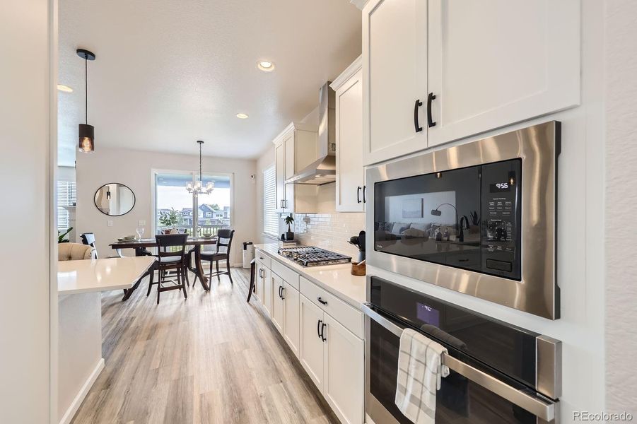 Furnished interior view inside a new home in Haskins Station, Arvada (Image 8).