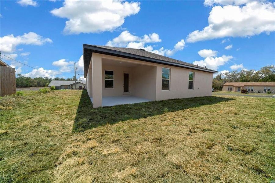 Exterior details and patio area of a home in , Spring Hill (Image 3).