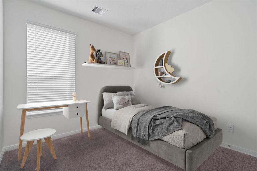 Secondary bedroom features plush carpet, neutral paint, lighting, large windows with privacy blinds and ample sized closet space.