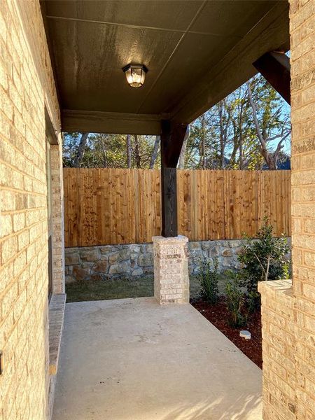 View of patio with trees at the side