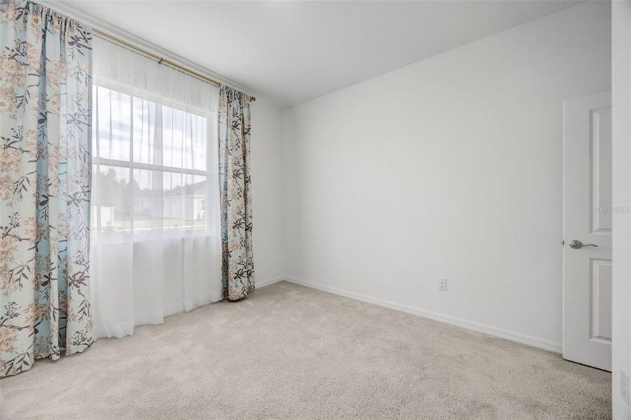 Spacious, unfurnished interior of a new home in Woodcreek, Wesley Chapel (Image 39).