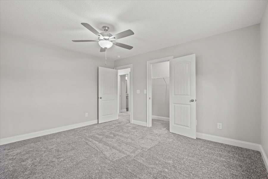 Representative unfurnished interior of a home built from the Enory by Enchanted Homes in Guadalupe Heights, Seguin (Image 42).