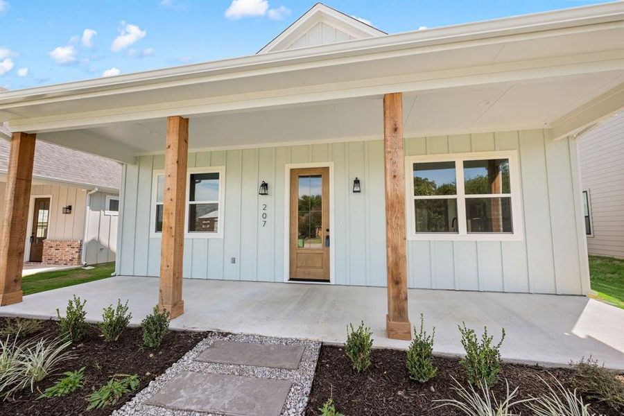 Front exterior of a new home in , Justin, TX, highlighting curb appeal (Image 21).
