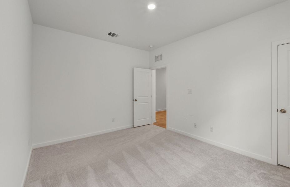 Spacious, unfurnished interior of a new home in Alto, San Marcos (Image 9).