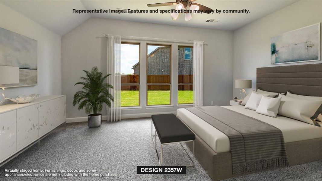 Carpeted bedroom featuring vaulted ceiling and ceiling fan