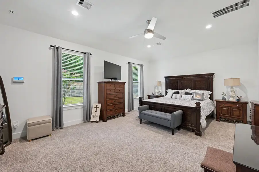 Huge primary bedroom (approximately 20' x 14'). Huge primary bedroom (approximately 20' x 14').