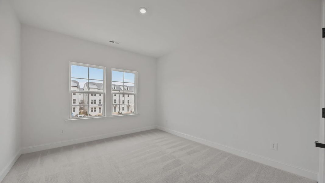 The Brentwood Plan by DRB Homes in River District, Charlotte NC.- Bedroom The Brentwood Plan by DRB Homes in River District, Charlotte NC.- Bedroom