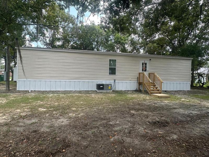 Exterior details and patio area of a home in , Lake City (Image 15).