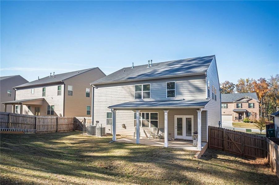 Exterior details and patio area of a home in , Stonecrest (Image 29).
