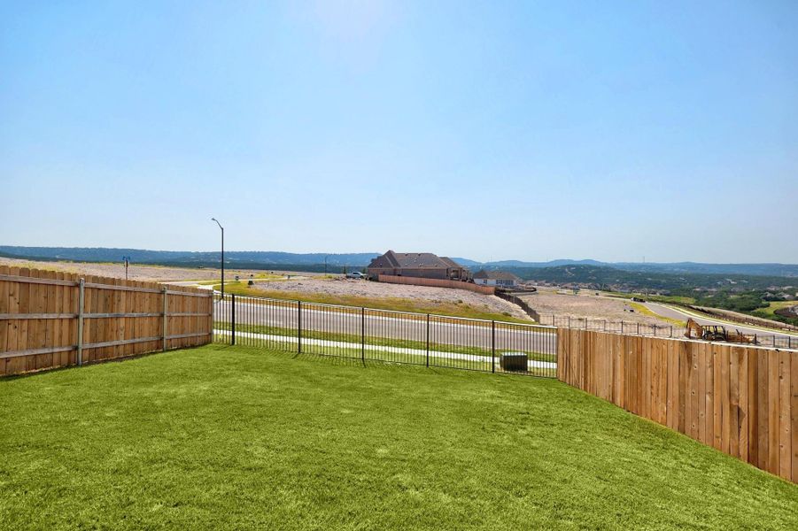 Front exterior of a new home in Lakeside at Tessera, Lago Vista, TX, highlighting curb appeal (Image 2). Front exterior of a new home in Lakeside at Tessera, Lago Vista, TX, highlighting curb appeal (Image 2).