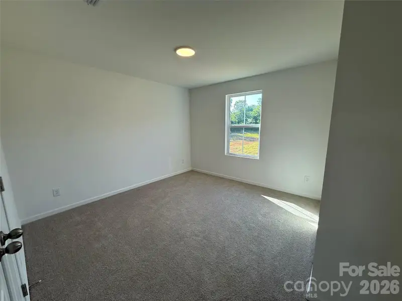 Spacious, unfurnished interior of a new home in , Granite Quarry (Image 25).