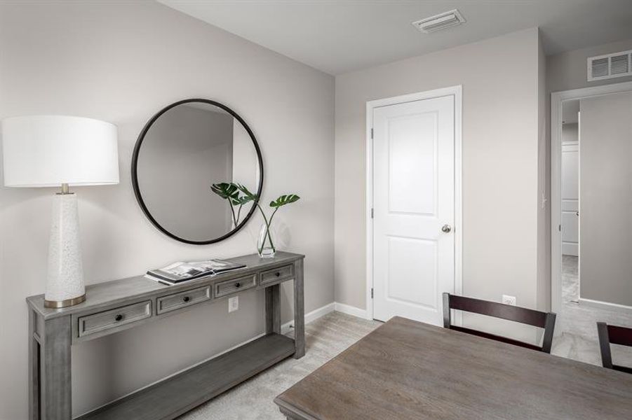 Representative furnished interior of a home built from the Poplar by Ryan Homes in West Main Townes, Sanford (Image 18).