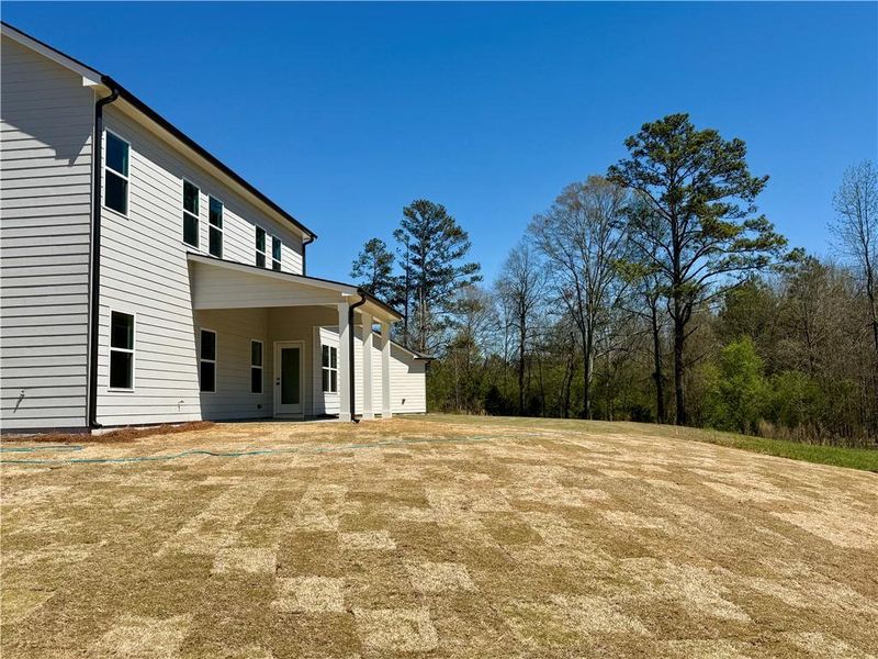 Exterior details and patio area of a home in Ponderosa Farms Estates, Gainesville (Image 23).