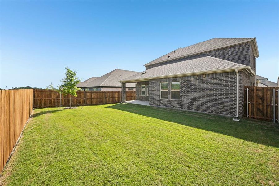 Exterior details and patio area of a home in Eastridge - Signature Series, McKinney (Image 22).