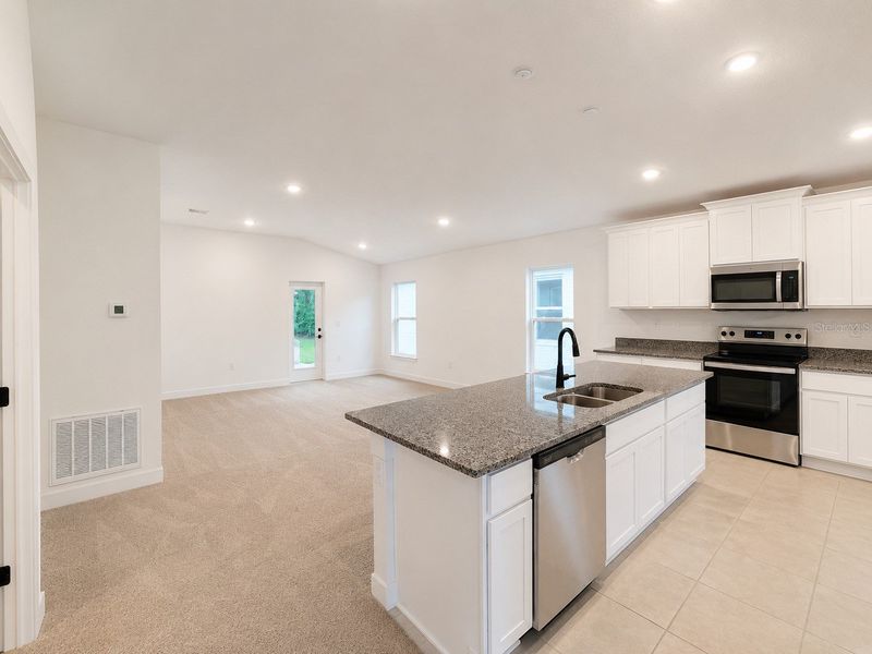 Furnished interior view inside a new home in Harmony Central, St. Cloud (Image 7).
