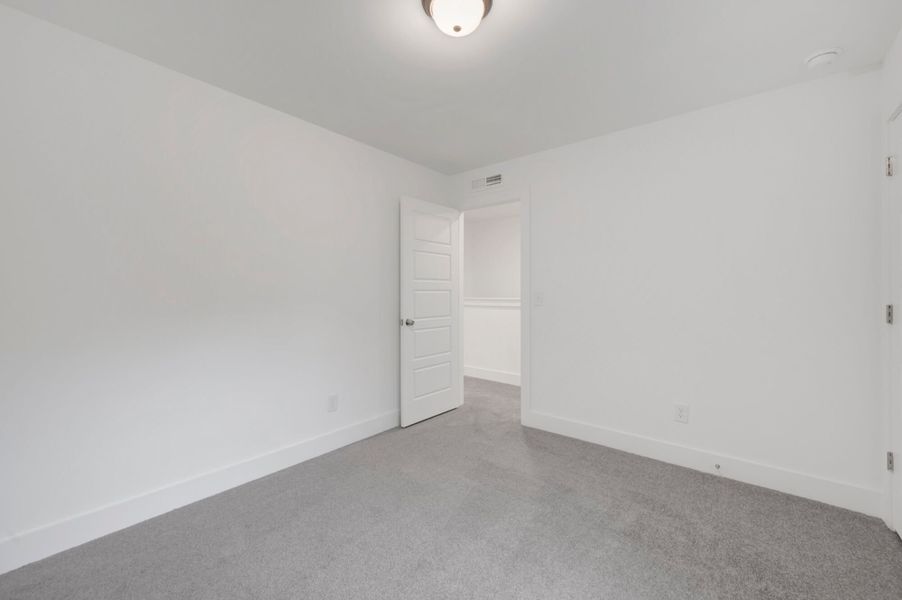 Spacious, unfurnished interior of a new home in Ashmore Townes, Garner (Image 26). Spacious, unfurnished interior of a new home in Ashmore Townes, Garner (Image 26).