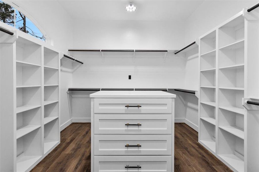 Now for a second surprise!!! Look at this primary closet. Featuring natural light, built in drawers and shelves to store all your goodies and maybe even enough space to hang all your special clothes.