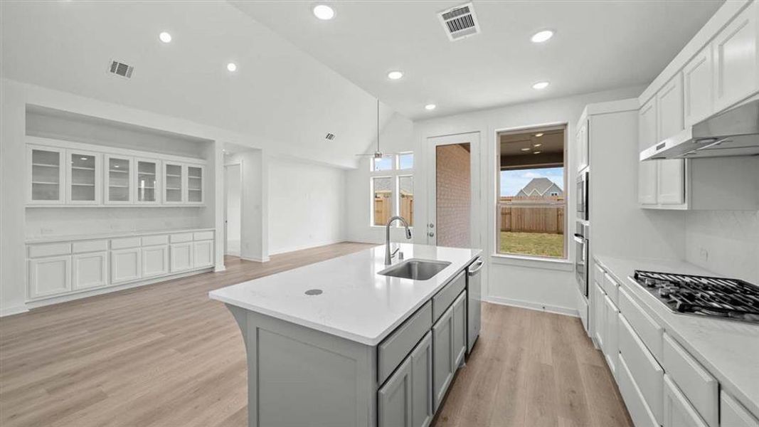 Kitchen with views of the backyard