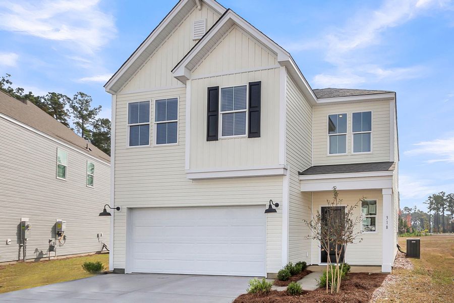 Front exterior of a new home in Wildcat Chase, Summerville, SC, highlighting curb appeal (Image 18).