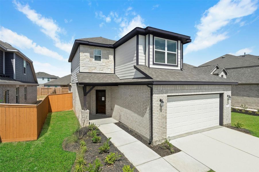 Exterior details and patio area of a home in Sunterra, Katy (Image 16).