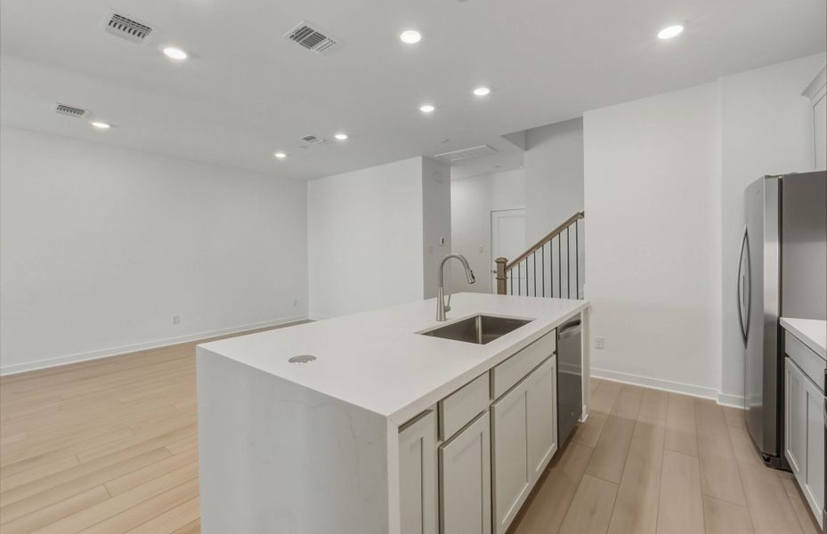 Furnished interior view inside a new home in Monarch on Main, Round Rock (Image 9).