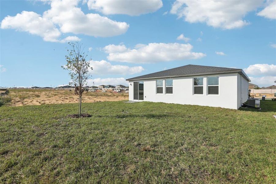 Exterior details and patio area of a home in Crosswinds - Signature Series, Haines City (Image 26).