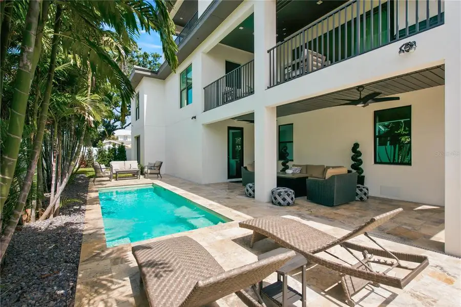 Exterior details and patio area of a home in , Belleair Beach (Image 4).