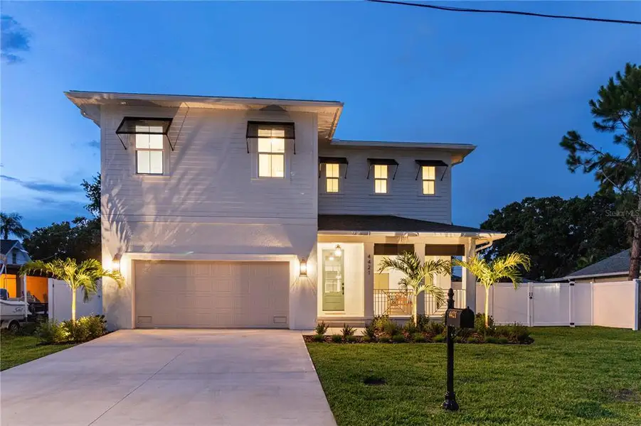 Front exterior of a new home in , Tampa, FL, highlighting curb appeal (Image 1). Front exterior of a new home in , Tampa, FL, highlighting curb appeal (Image 1).