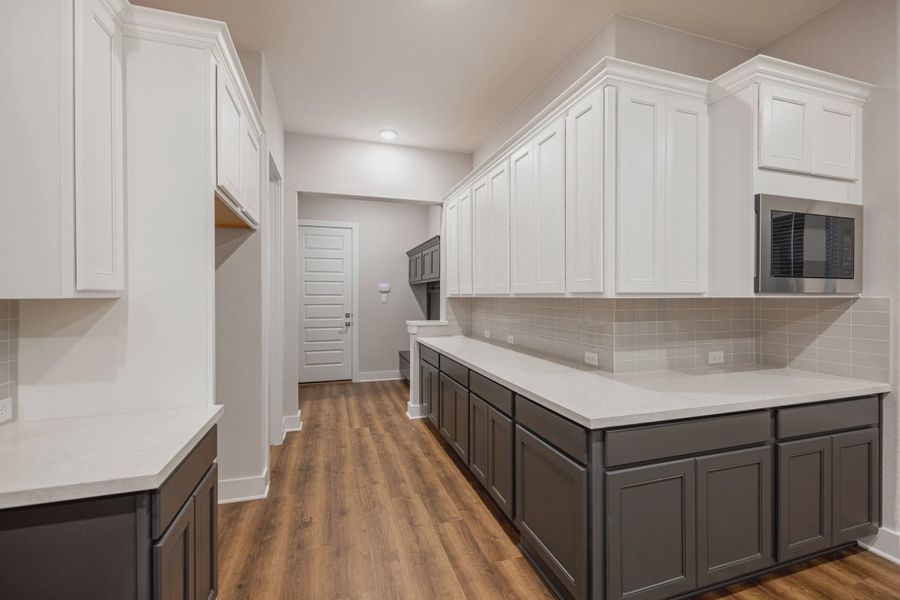 Representative furnished interior of a home built from the Kaylee by Chesmar Homes in Caliza Reserve, Boerne (Image 6).