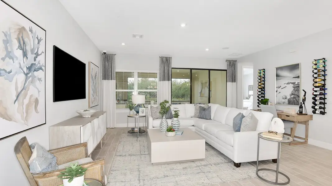Furnished interior view inside a new home in Esplanade at Tradition, Port St. Lucie (Image 4).