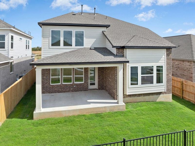 Exterior details and patio area of a home in University Heights, Round Rock (Image 19).