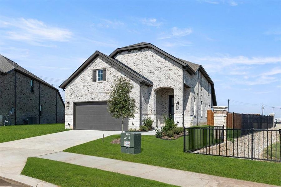 Front exterior of a new home in Creekview Fossil Ridge, Pilot Point, TX, highlighting curb appeal (Image 1).