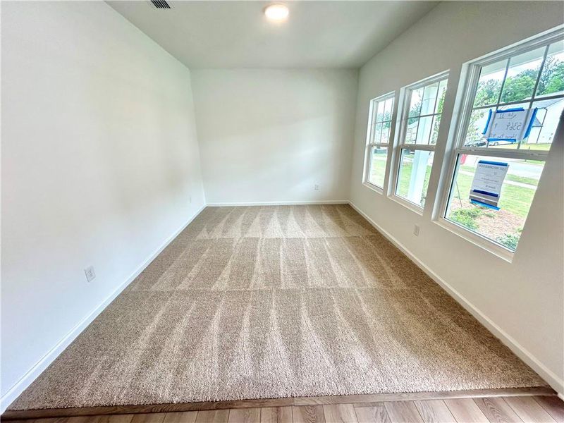 Spacious, unfurnished interior of a new home in The Pointe at Heron Bay, Locust Grove (Image 10).