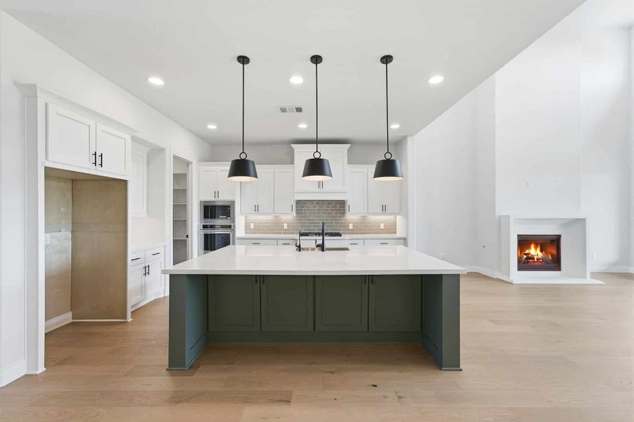 Furnished interior view inside a new home in Bridgeland 50′, Cypress (Image 8).