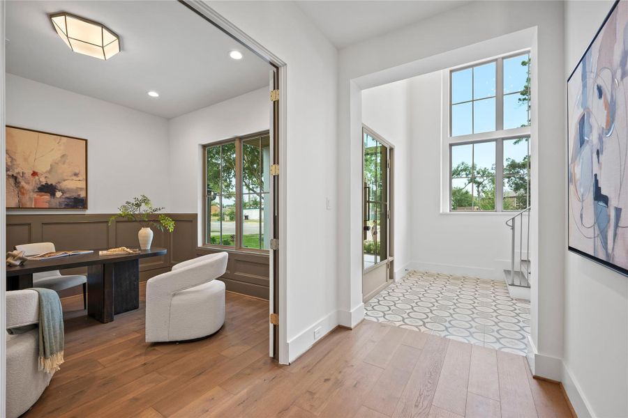 Welcome open foyer with a view of the office/study, creating a warm and elegant feel. Welcome open foyer with a view of the office/study, creating a warm and elegant feel.