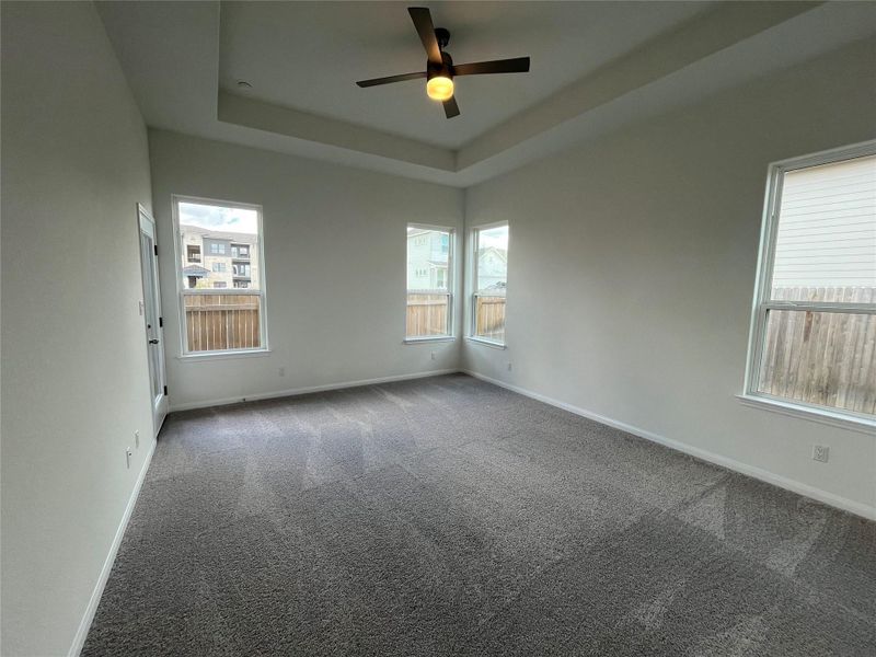 Master bedroom with access to patio.