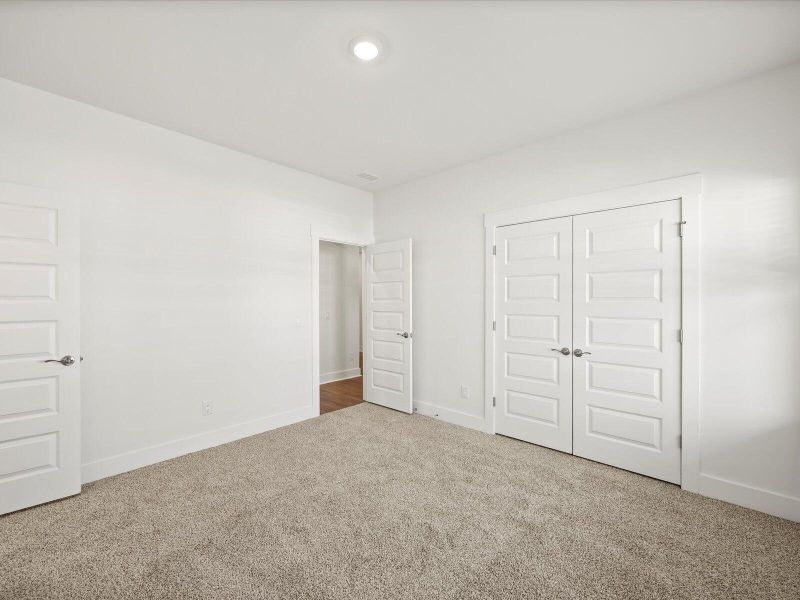 Spacious, unfurnished interior of a new home in The Coves at Lakes of Cane Bay II, Summerville (Image 29). Spacious, unfurnished interior of a new home in The Coves at Lakes of Cane Bay II, Summerville (Image 29).