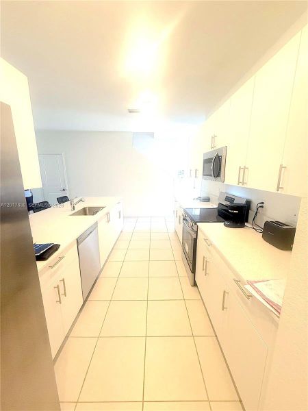 Furnished interior view inside a new home in , Dania Beach (Image 13).