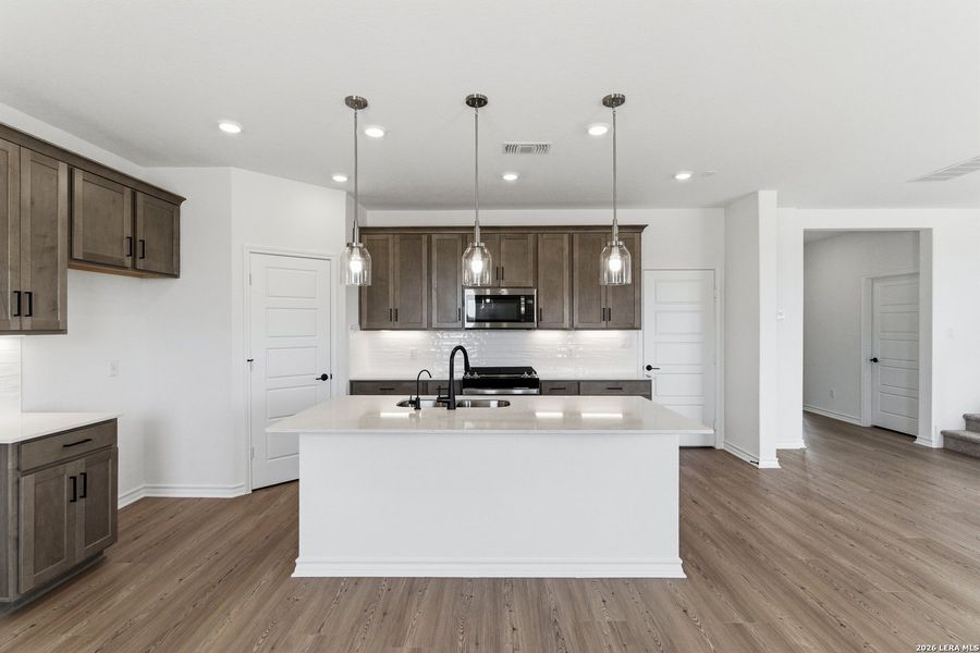 Furnished interior view inside a new home in Nopal Valley, San Antonio (Image 16).