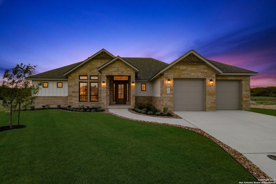 Front exterior of a new home in , Castroville, TX, highlighting curb appeal (Image 26). Front exterior of a new home in , Castroville, TX, highlighting curb appeal (Image 26).