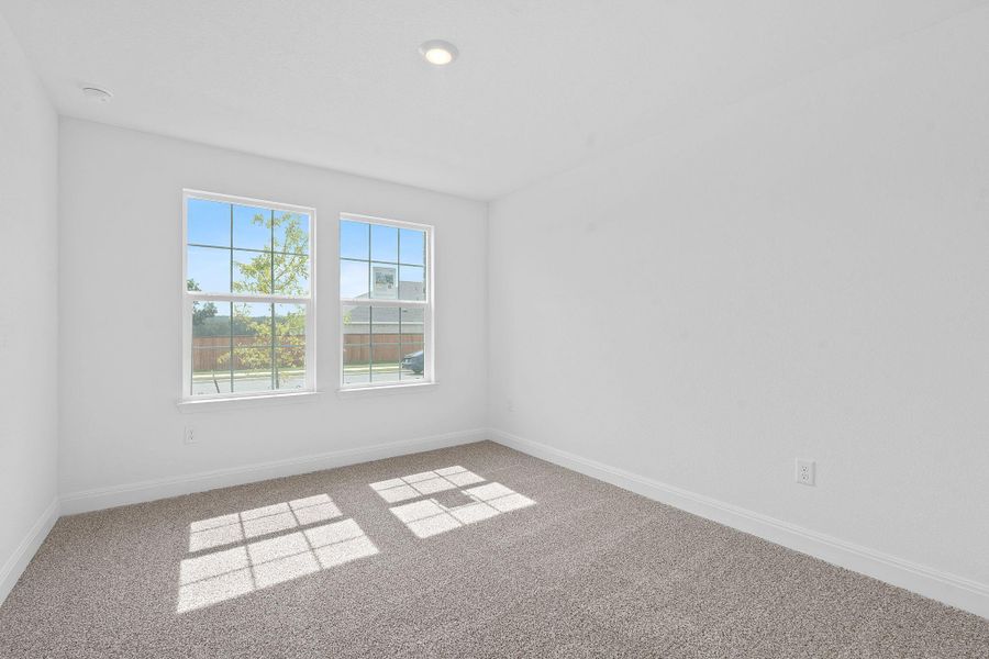 Empty room featuring light carpet and recessed lighting Empty room featuring light carpet and recessed lighting