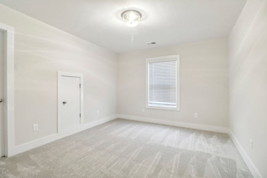 Representative unfurnished interior of a home built from the Baymore II by Great Southern Homes in Edwards Ridge, Central (Image 30).
