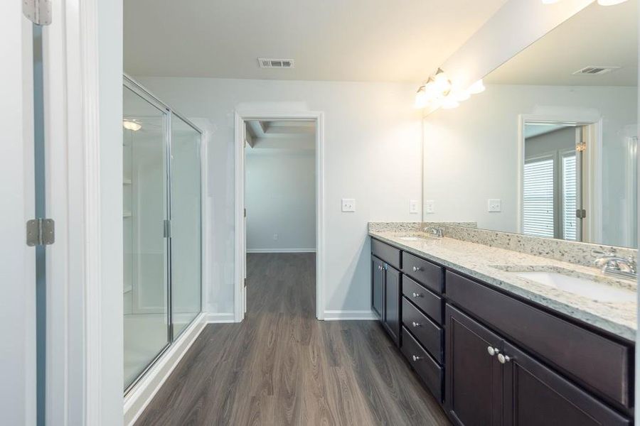 Furnished interior view inside a new home in , Suwanee (Image 12). Furnished interior view inside a new home in , Suwanee (Image 12).