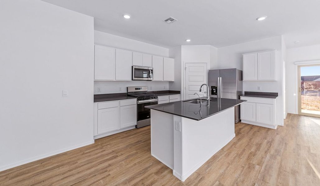 Representative furnished interior of a home built from the Dalea by D.R. Horton in Barnett Village, Marana (Image 6).