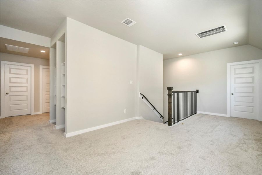 Enjoy this beautiful game room! Sample photo of completed home with similar floor plan. Actual colors and selections may vary.