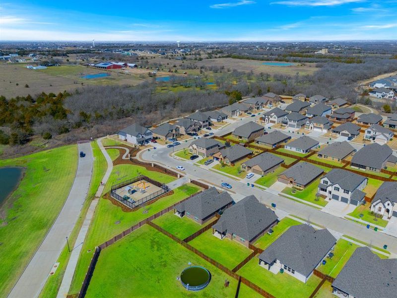 Birds eye view of property with a residential view