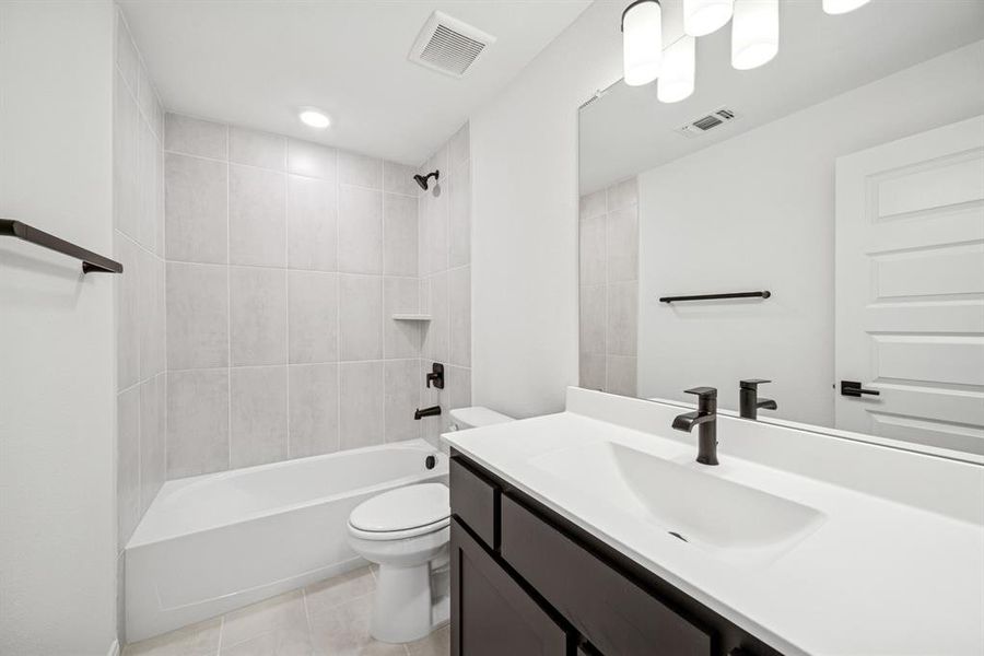 Furnished interior view inside a new home in Karis - Village Series, Crowley (Image 4). Furnished interior view inside a new home in Karis - Village Series, Crowley (Image 4).